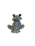 Rhinestone Frog Brooch with multicolored gemstones on a gray background
