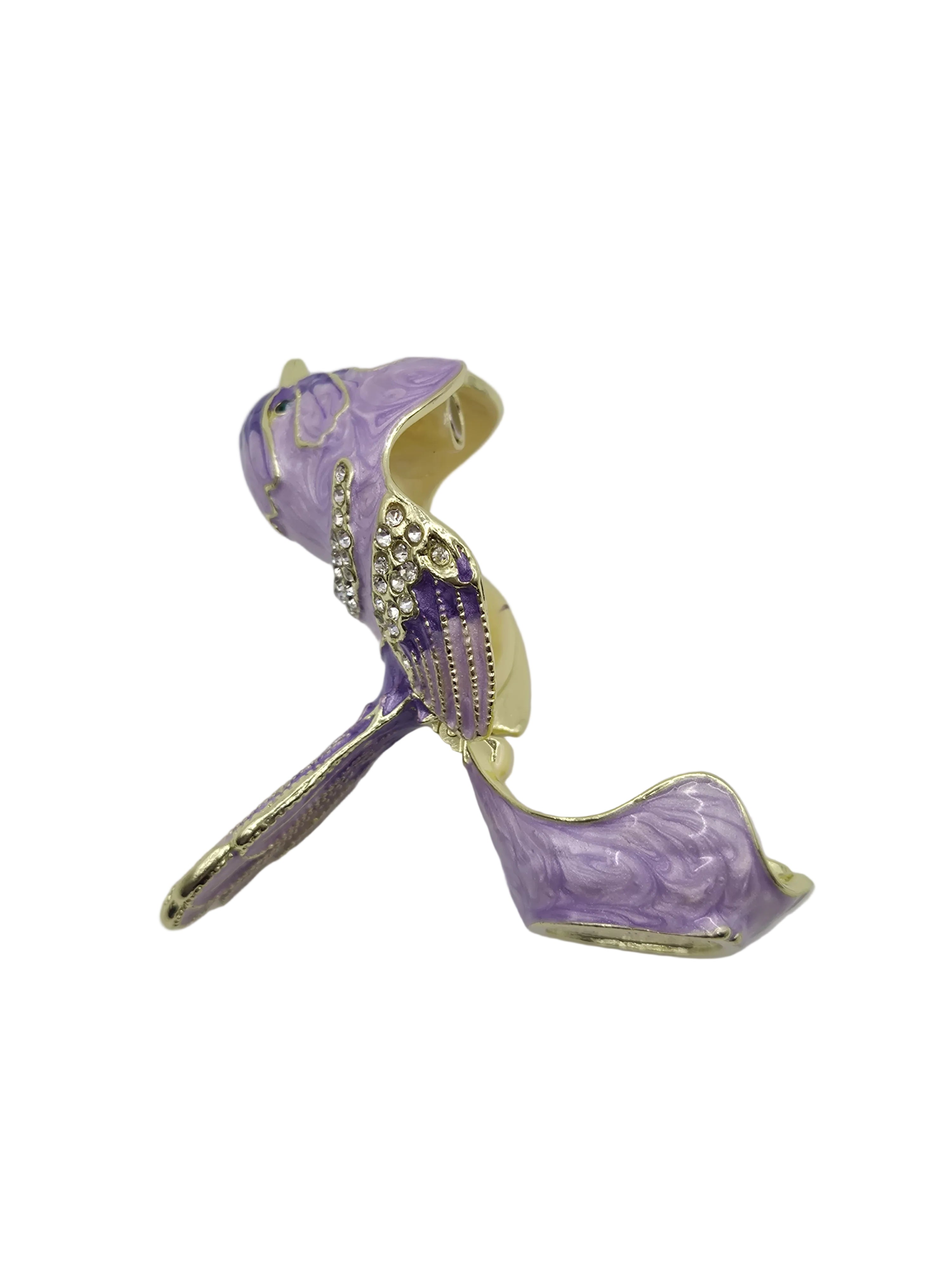Purple trinket box with gold accents on a gray background