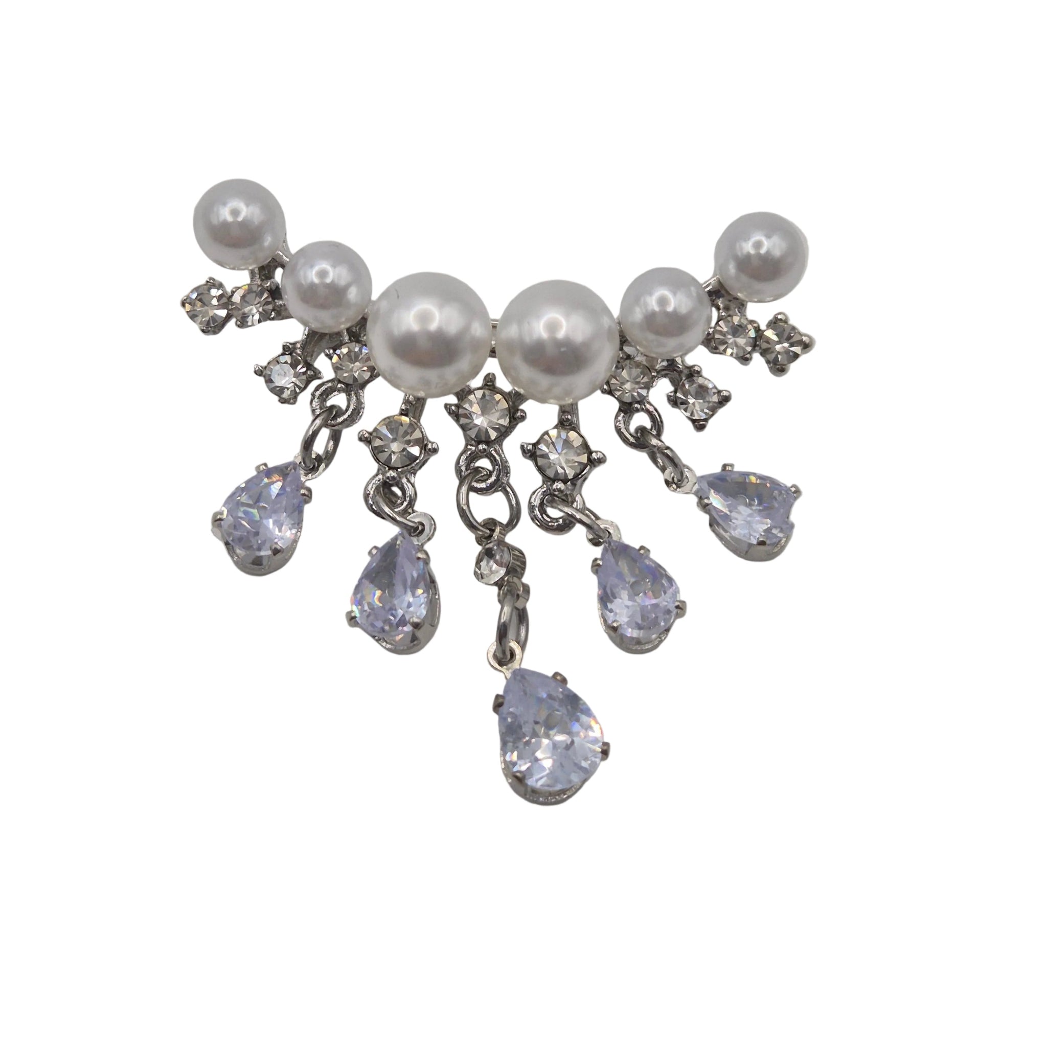 A silver-tone dangle brooch featuring white faux pearls and clear rhinestones, with five teardrop-shaped clear rhinestones hanging from silver chains, set against a plain white background.