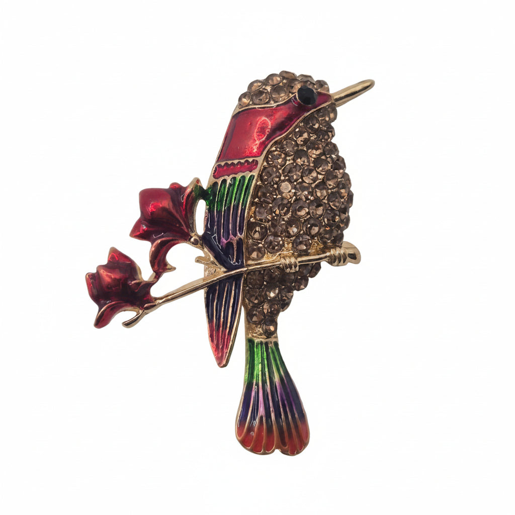 Colorful bird shaped brooch on a white background