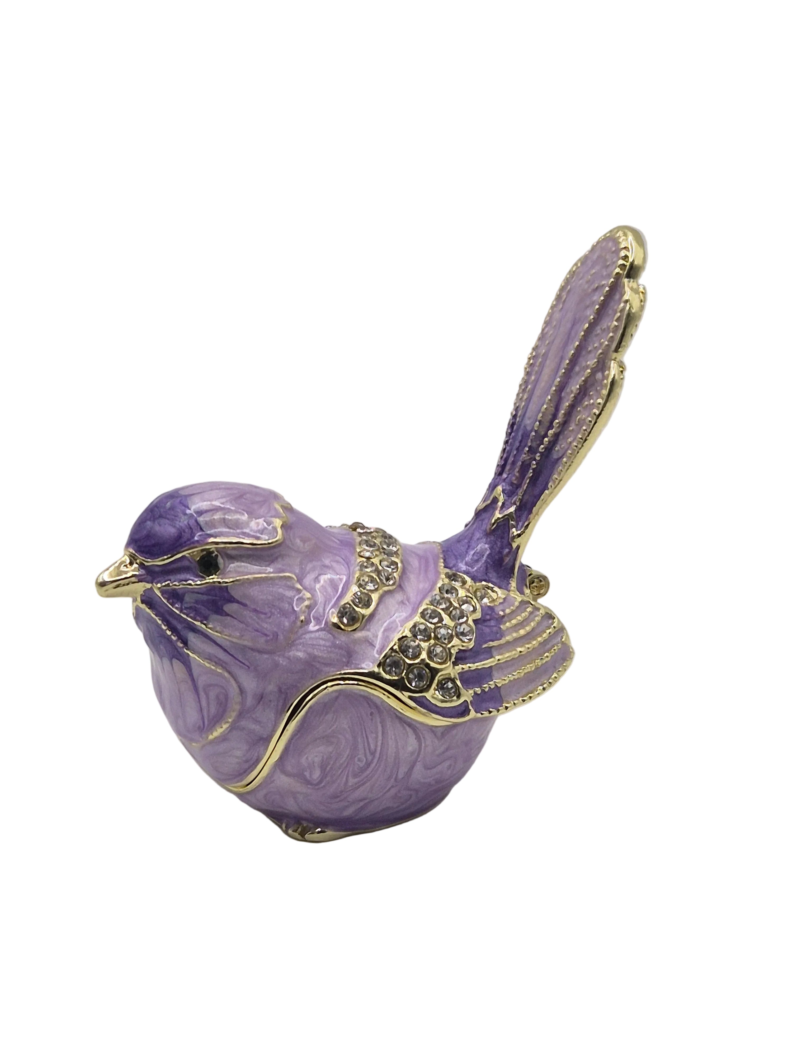 Purple bird-shaped trinket pot with gold accents on a white background