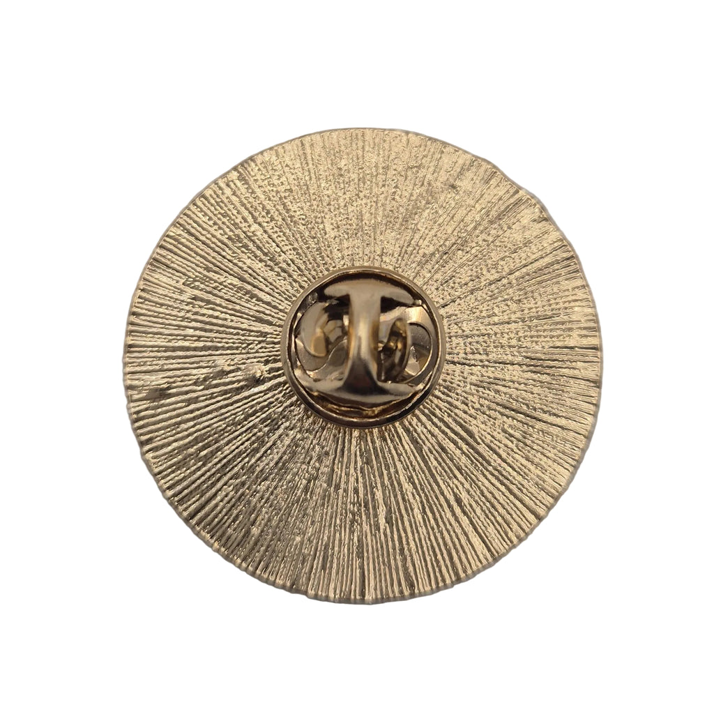 gold moon and stars celestial pin brooch detail on white background