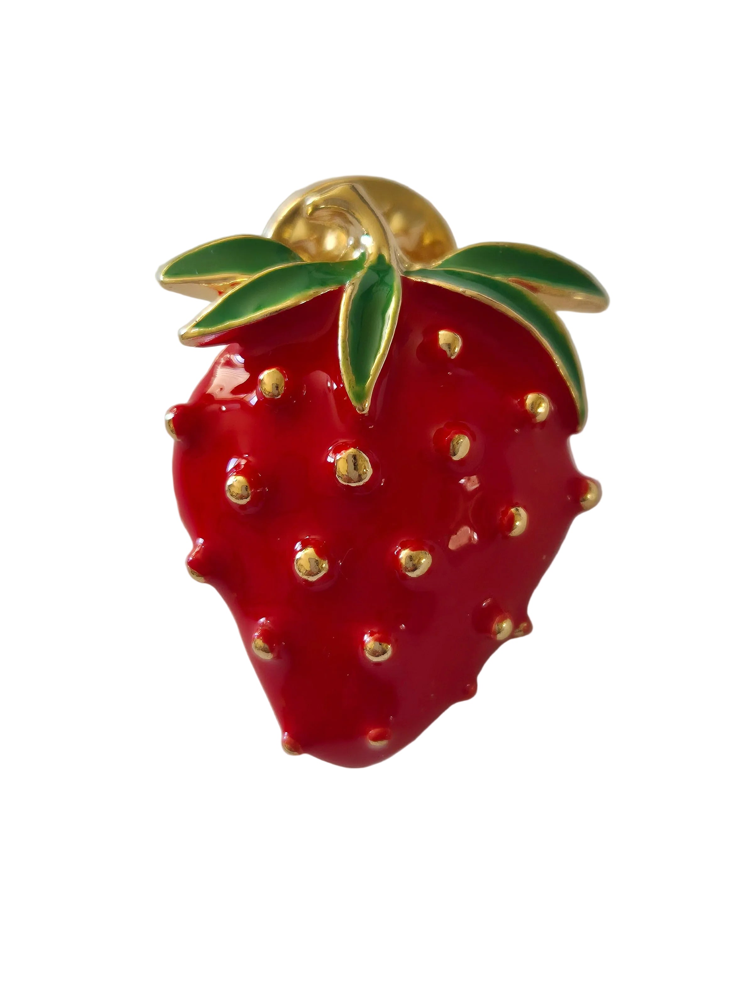 Strawberry-shaped brooch with gold accents on a white background