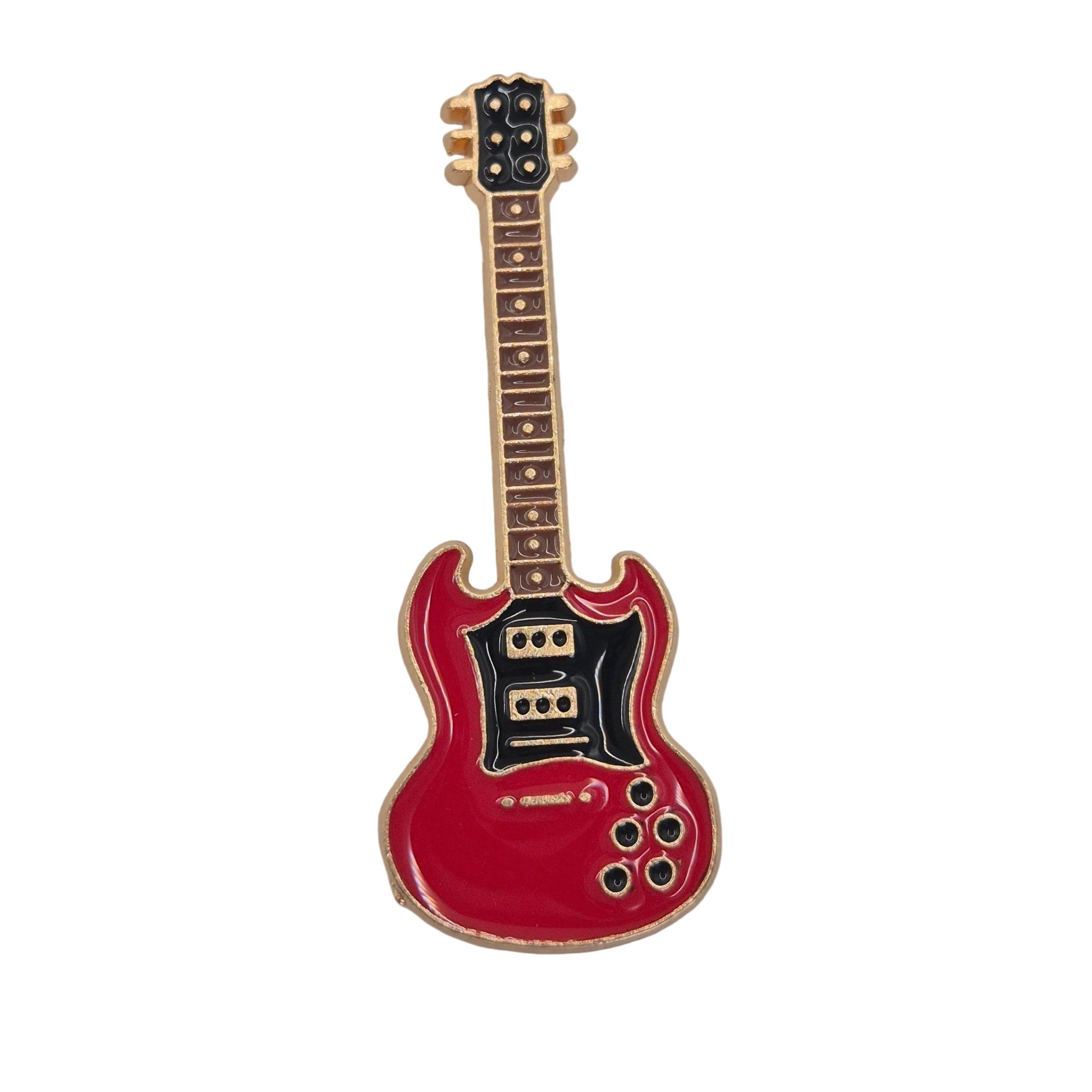 A miniature electric guitar enamel pin in red with a black pickguard and gold-toned neck, displayed on a neutral white background.