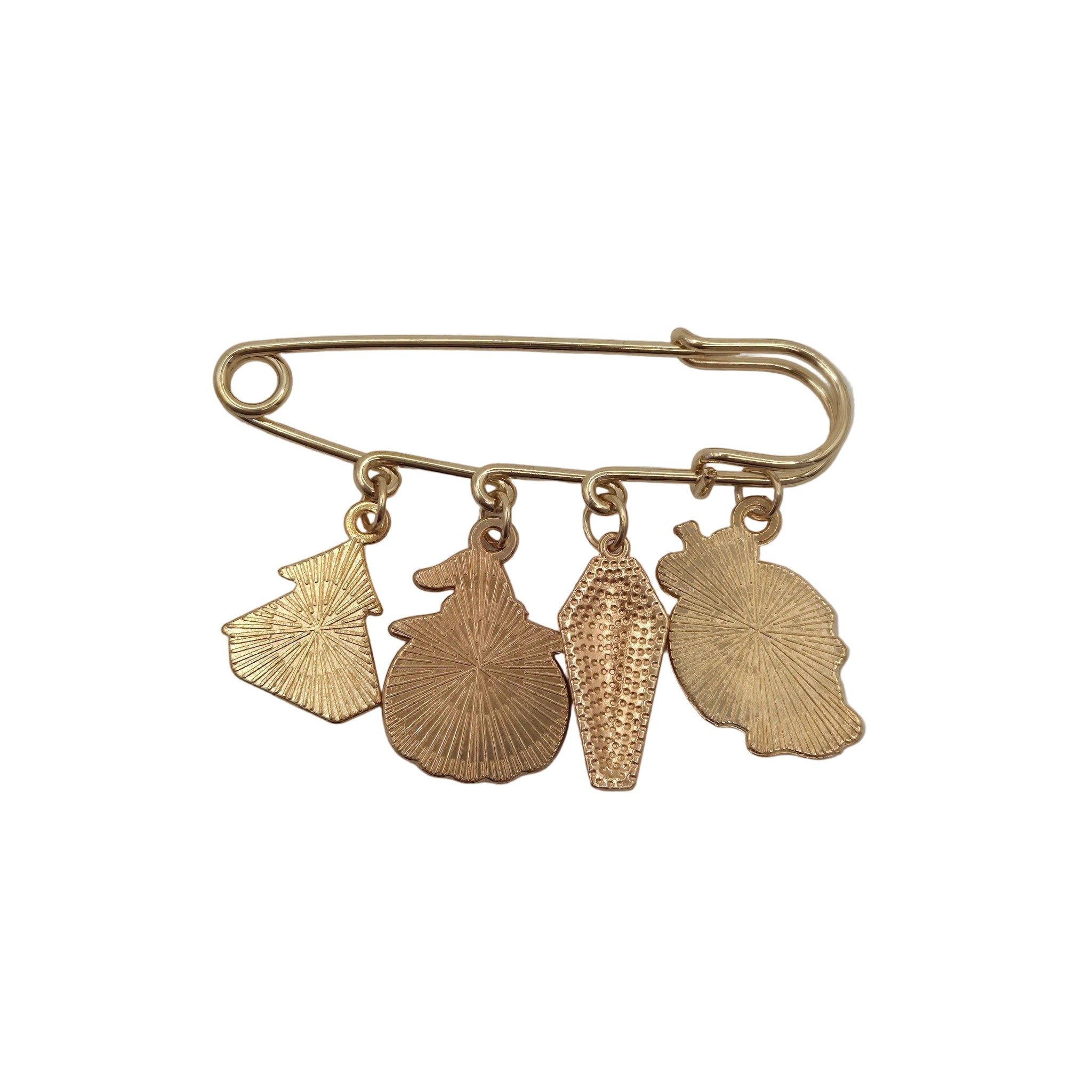 A gold-tone safety pin brooch with five textured shell-shaped charms, displayed on a white background.