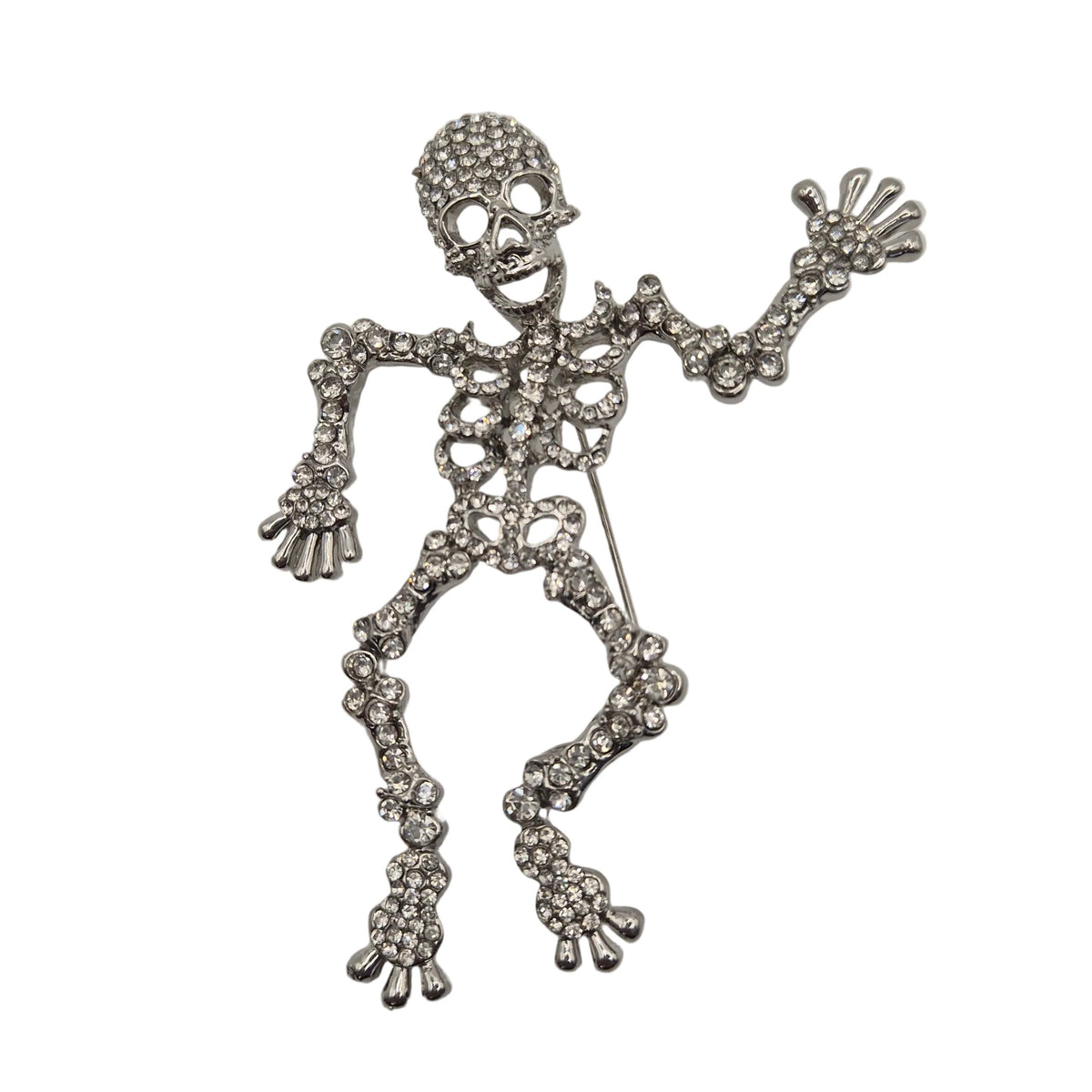A silver-tone skeleton pin embellished with clear rhinestones, shown against a plain white background.