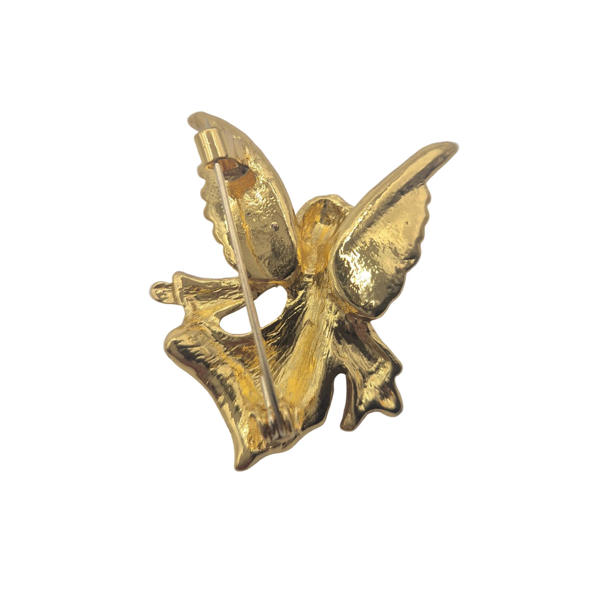 A gold-plated metal angel wing brooch with a textured finish and a pin fastener visible on the side, shown against a plain white background.