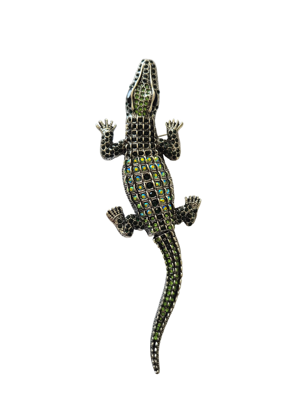 Jewelled crocodile brooch on a white background