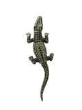 Jewelled crocodile brooch on a white background
