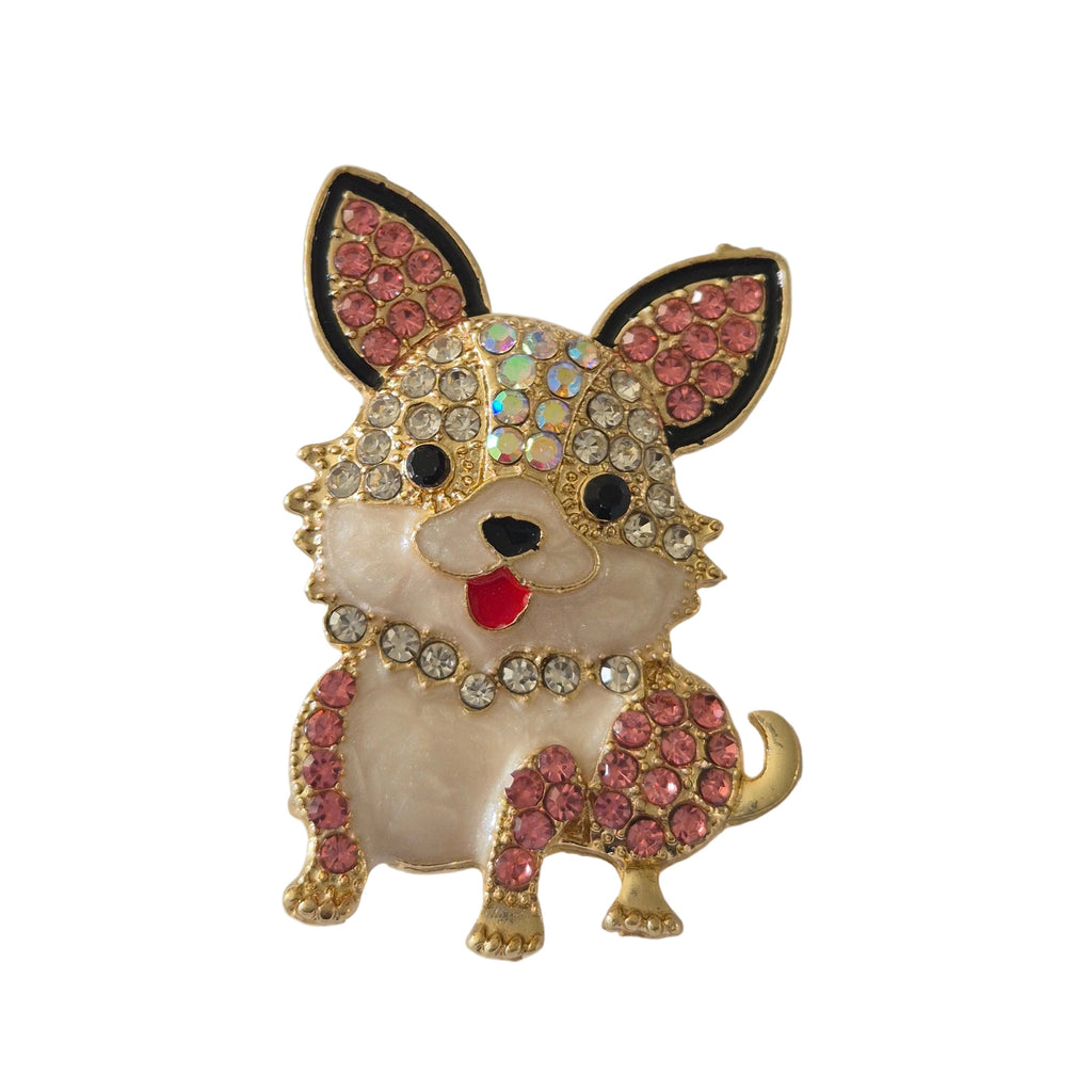 Decorative brooch with a dog design and rhinestone embellishments on a light gray background