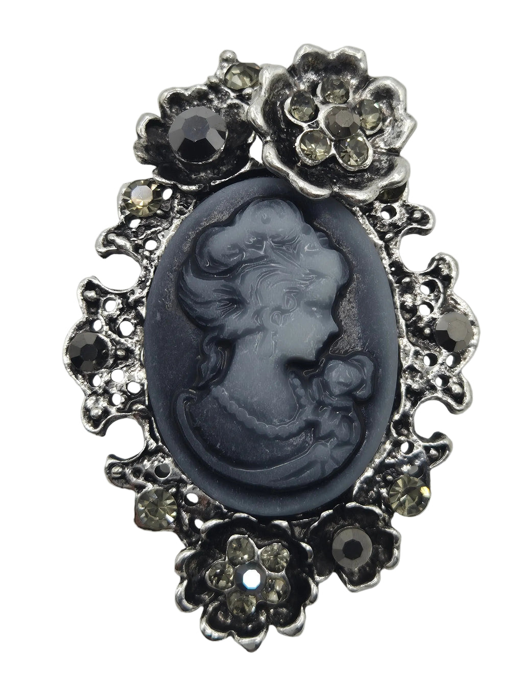 A vintage-style cameo brooch featuring a dark gray carved oval portrait in the center, surrounded by an ornate silver-tone floral border with small clear rhinestone accents, set against a plain white background.