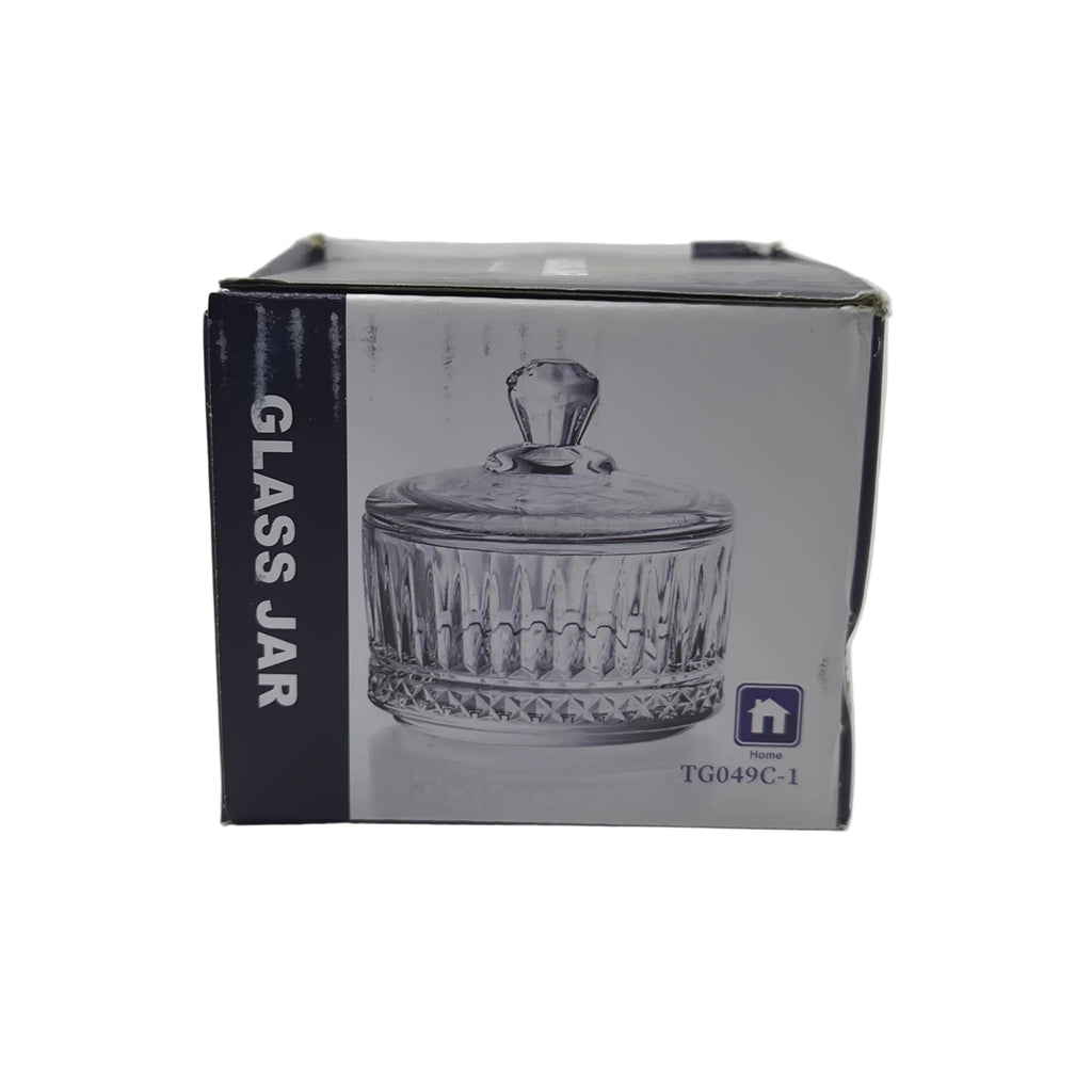A boxed glass jar with a lid, shown from the front and side. The packaging features a printed image of the clear ribbed glass jar and the text 'GLASS JAR' on a box.