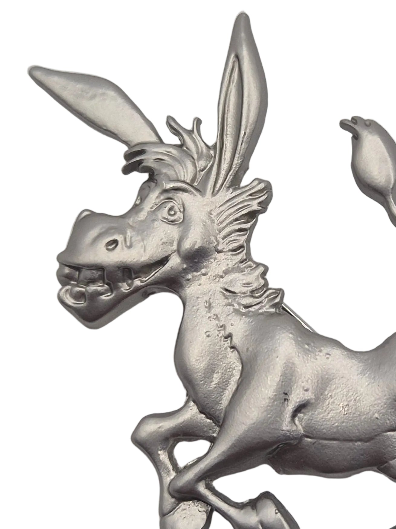 A close-up of a metallic silver donkey figurine with a textured, pewter-like finish, shown against a plain white background.