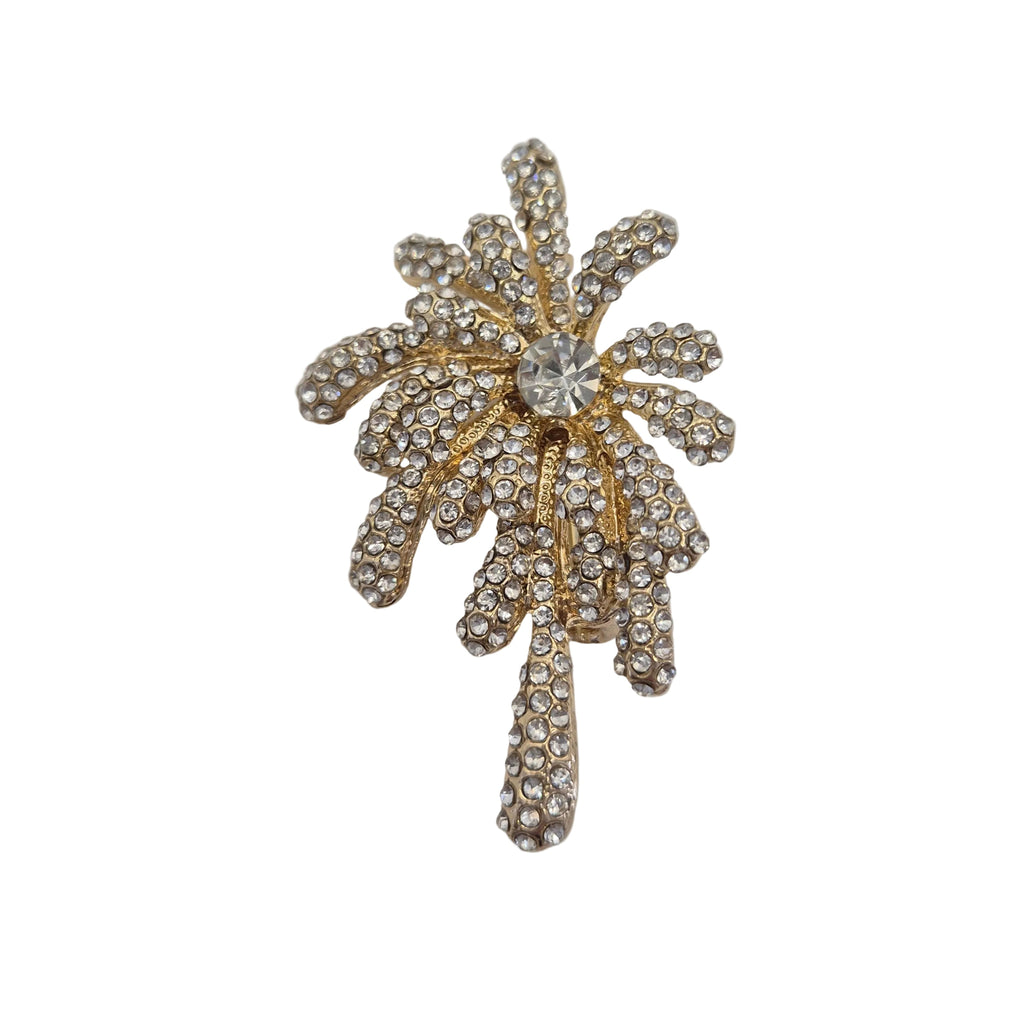 Gold rhinestone detail firework brooch pins displayed against a plain white background.