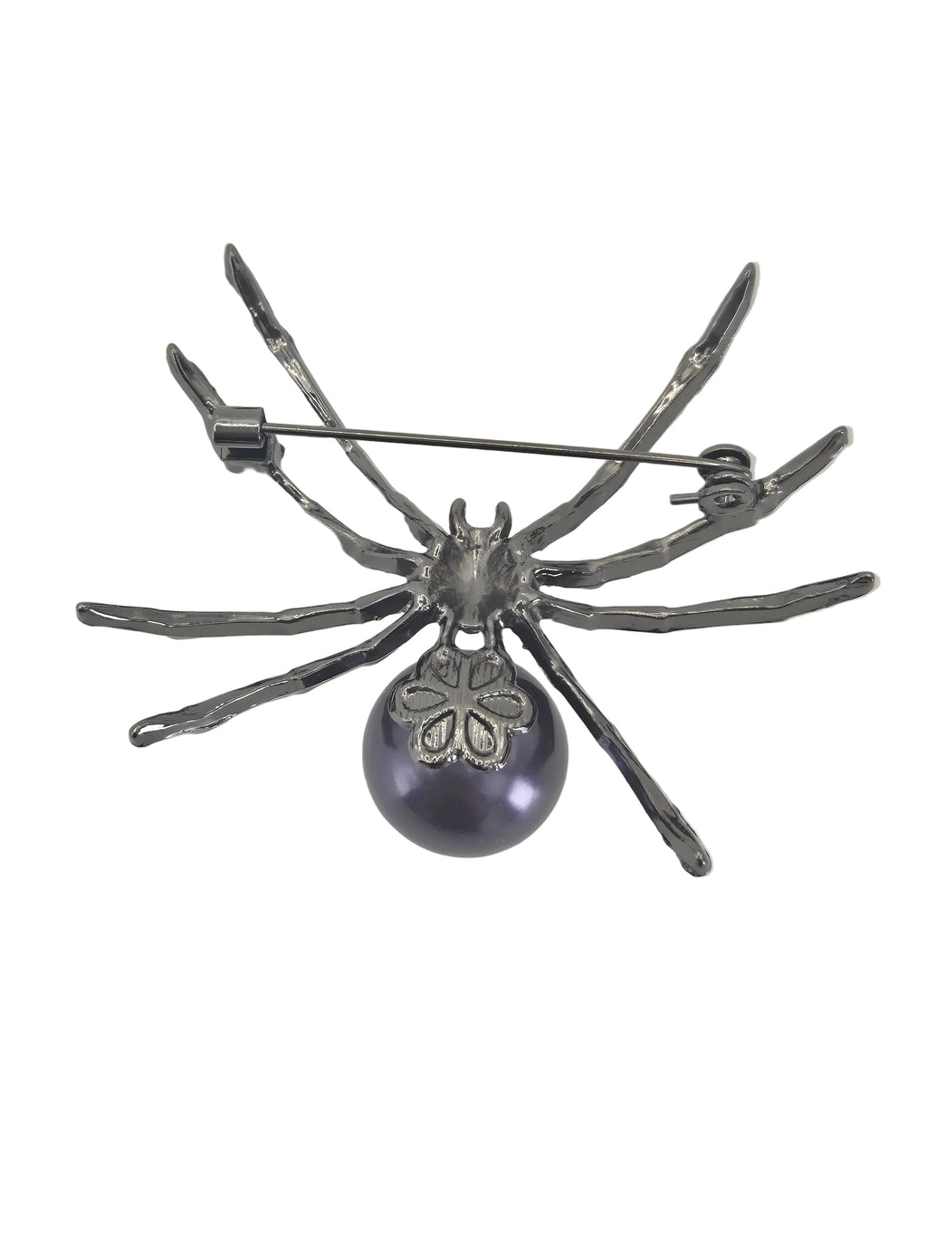 A spider-shaped brooch with metallic silver legs and a dark purple round pearl pendant, shown against a plain white background.