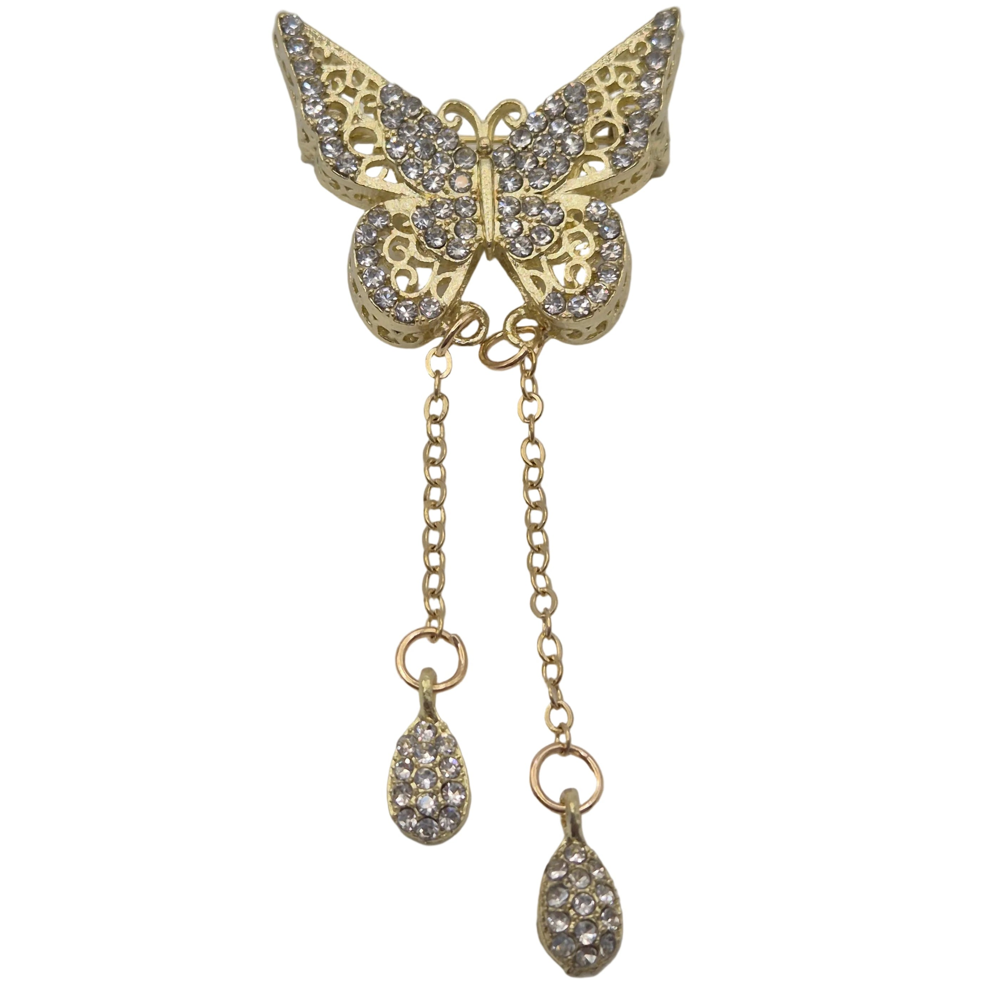 Gold butterfly brooch with rhinestone embellishments and two dangling chain teardrop charms, shown on a plain white background.