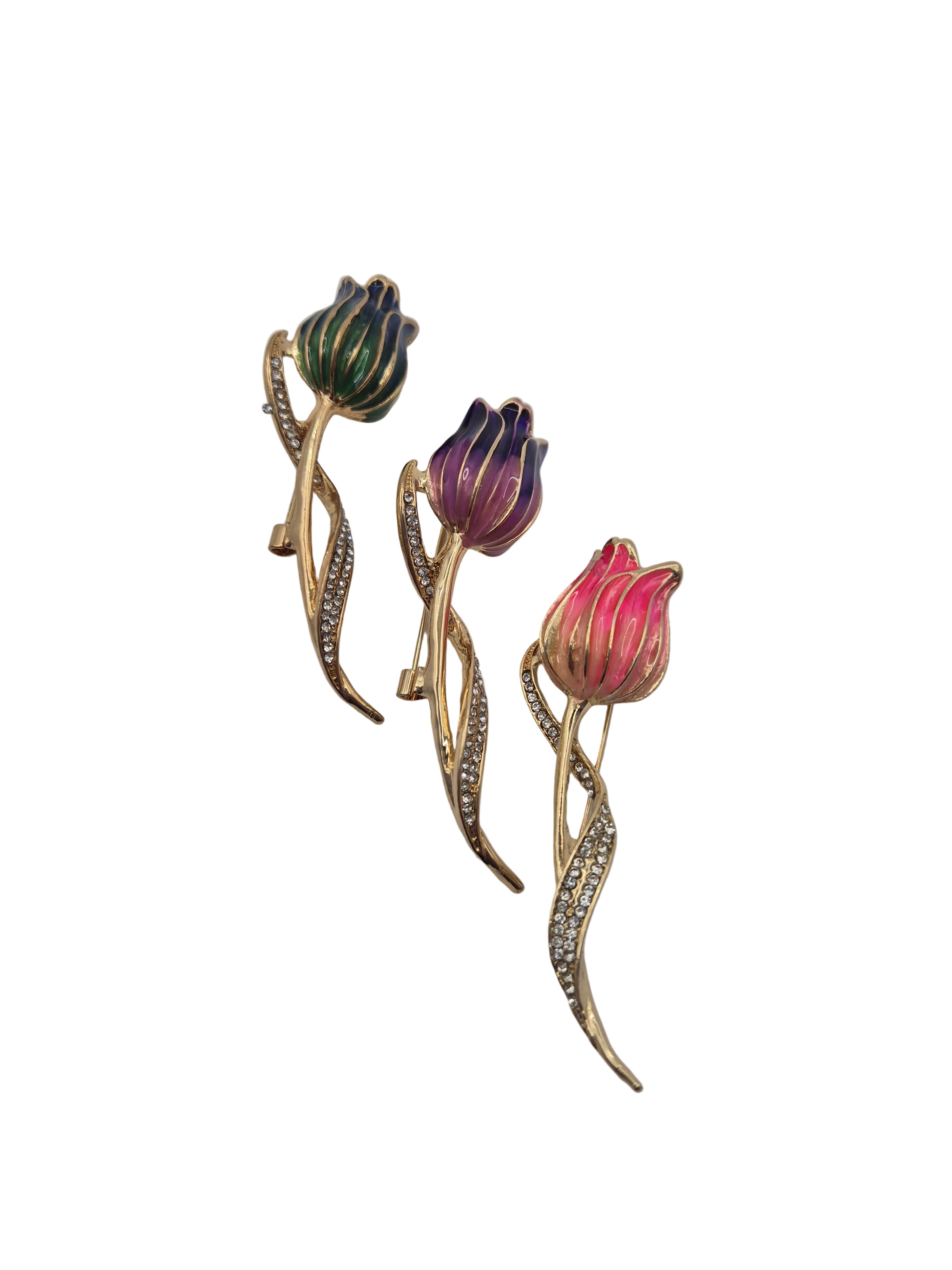Decorative tulip brooch with floral design on a white background
