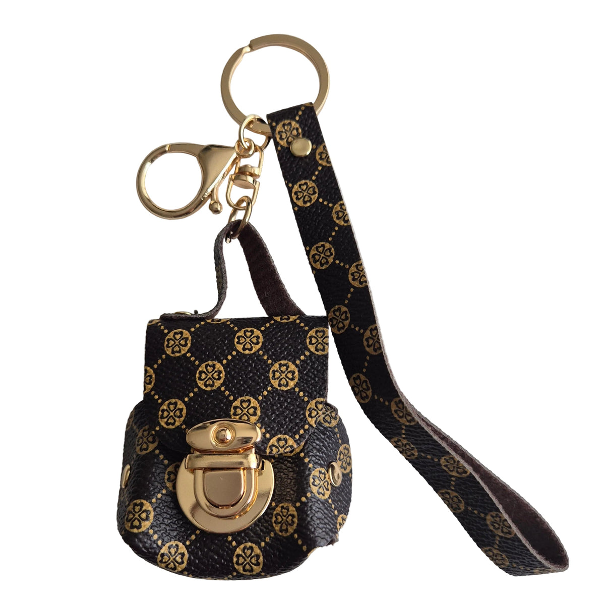 A small brown and gold mini bag keychain with a gold-tone clasp and a matching wristlet strap, shown on a plain white background.