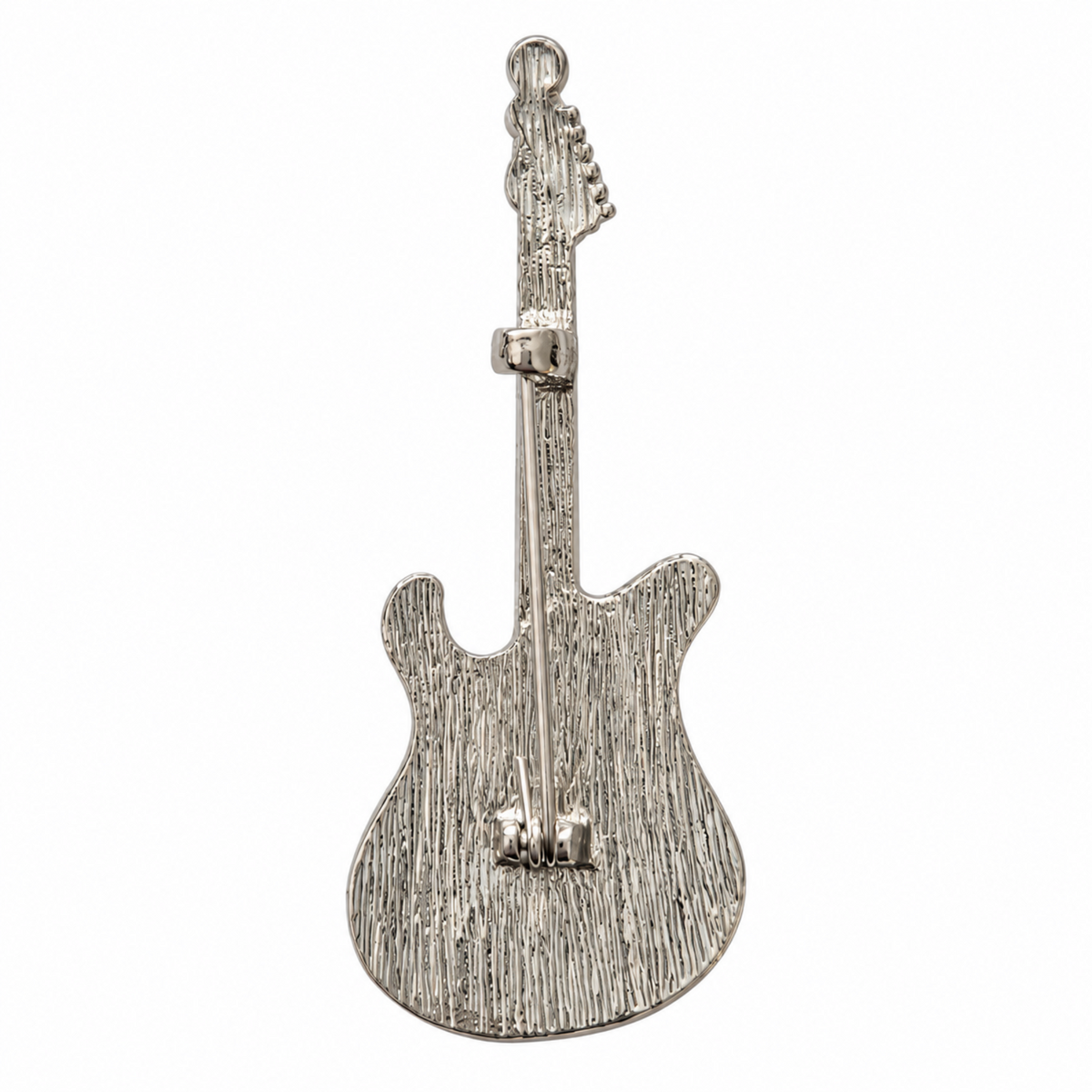 Silver-tone electric guitar brooch with a pearlescent white and black enamel body and clear rhinestones along the neck, shown on a white background.
