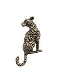 A leopard-shaped brooch or pin with a spotted pattern, featuring a small green stone for an eye, set against a plain light gray background.