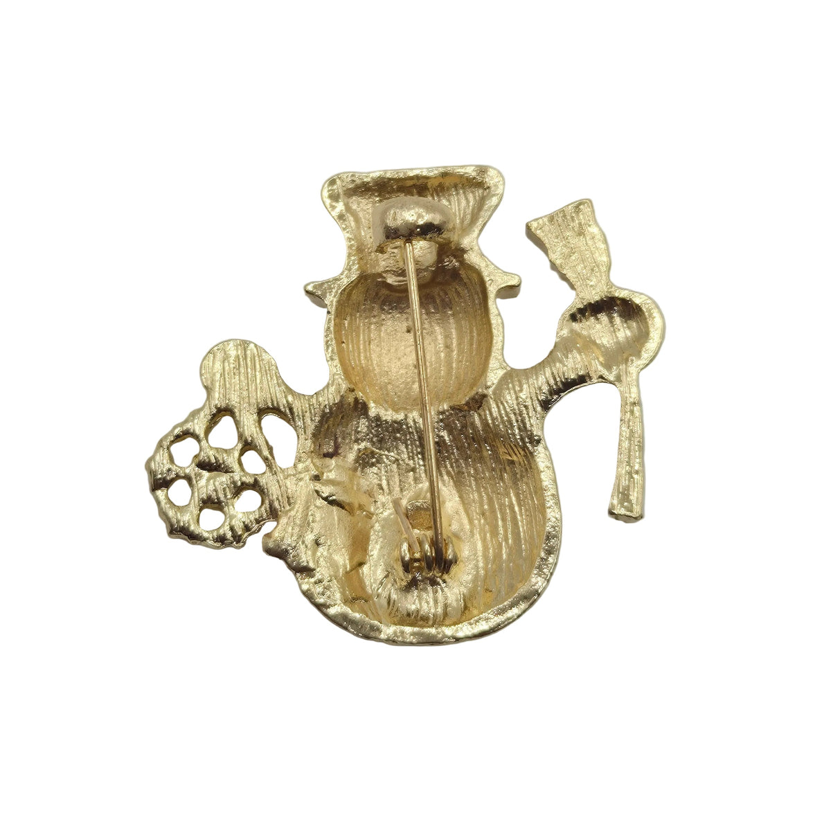 Reverse gold tone side of a snowman brooch showing the pin mechanism, displayed against a plain white background.