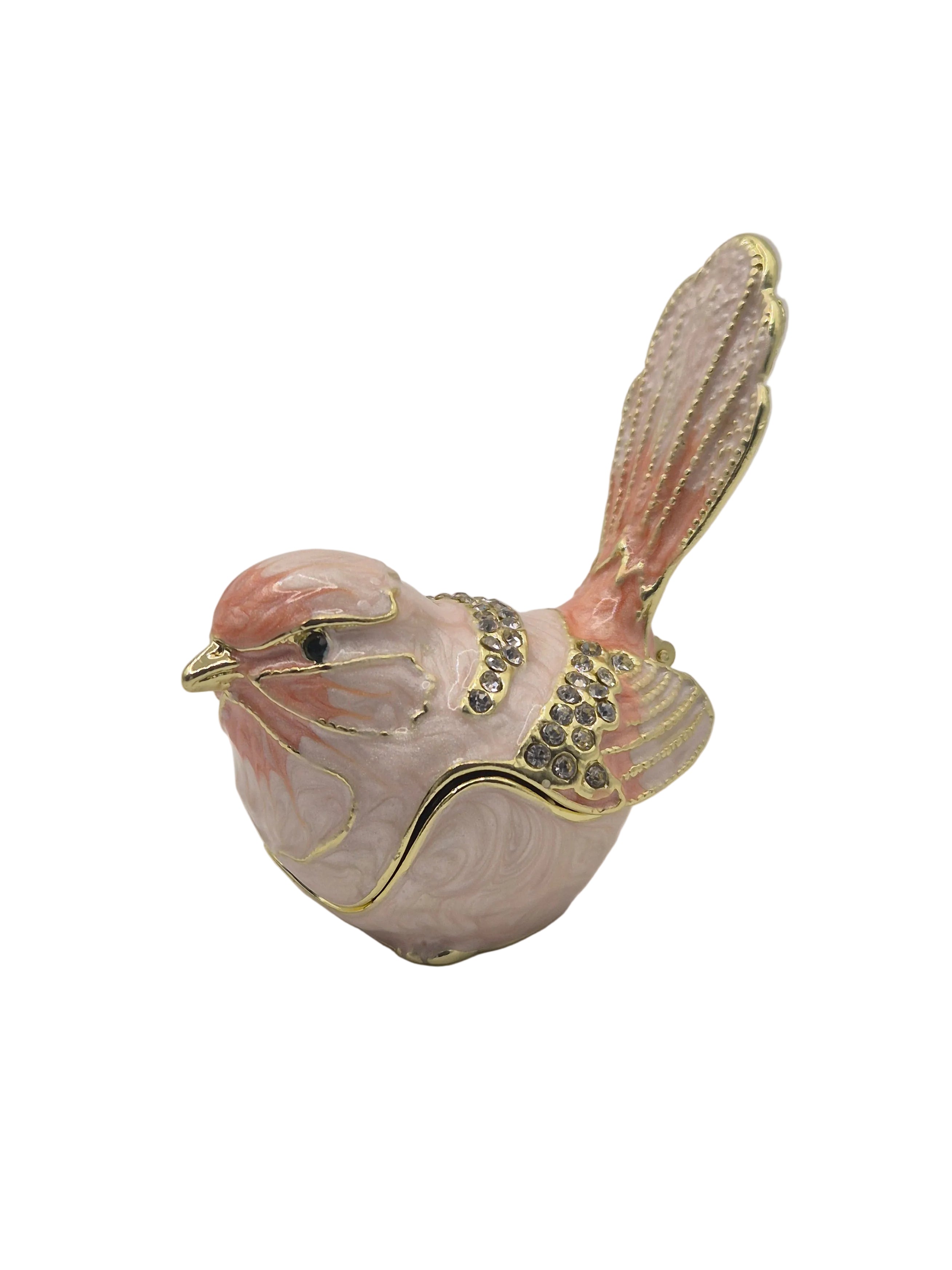 Pink bird trinket pot with gold accents on a white background