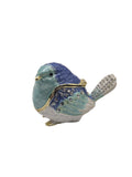 bird shape jewelry trinket pot blue and white design on a gray background
