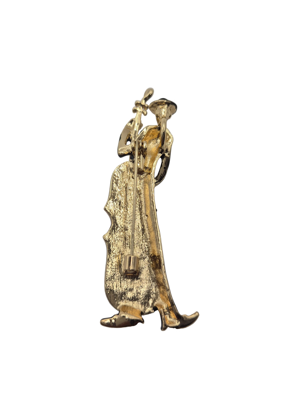 Gold-colored figurine on a gray background