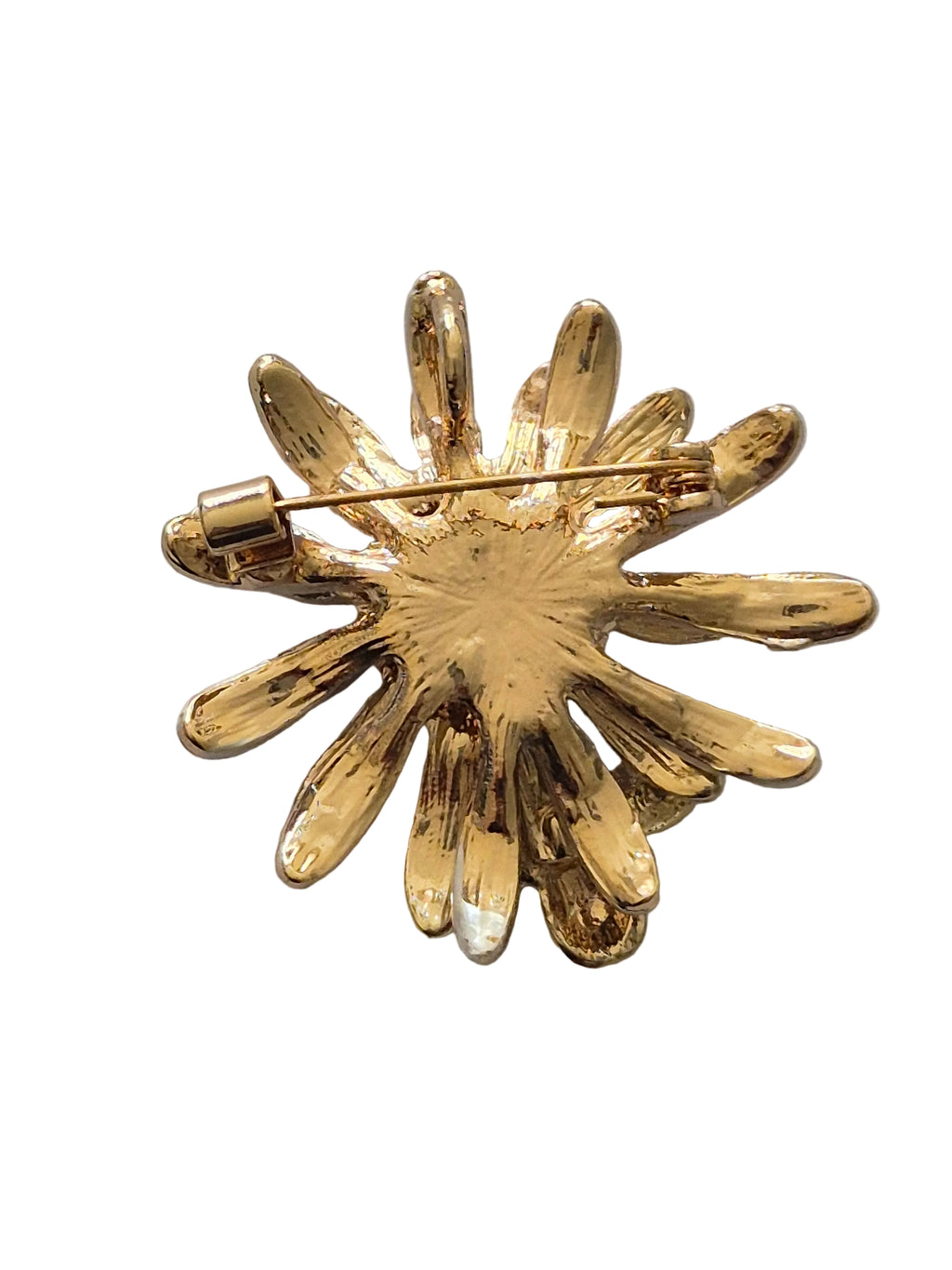 Gold daisy bee brooch on a white background
