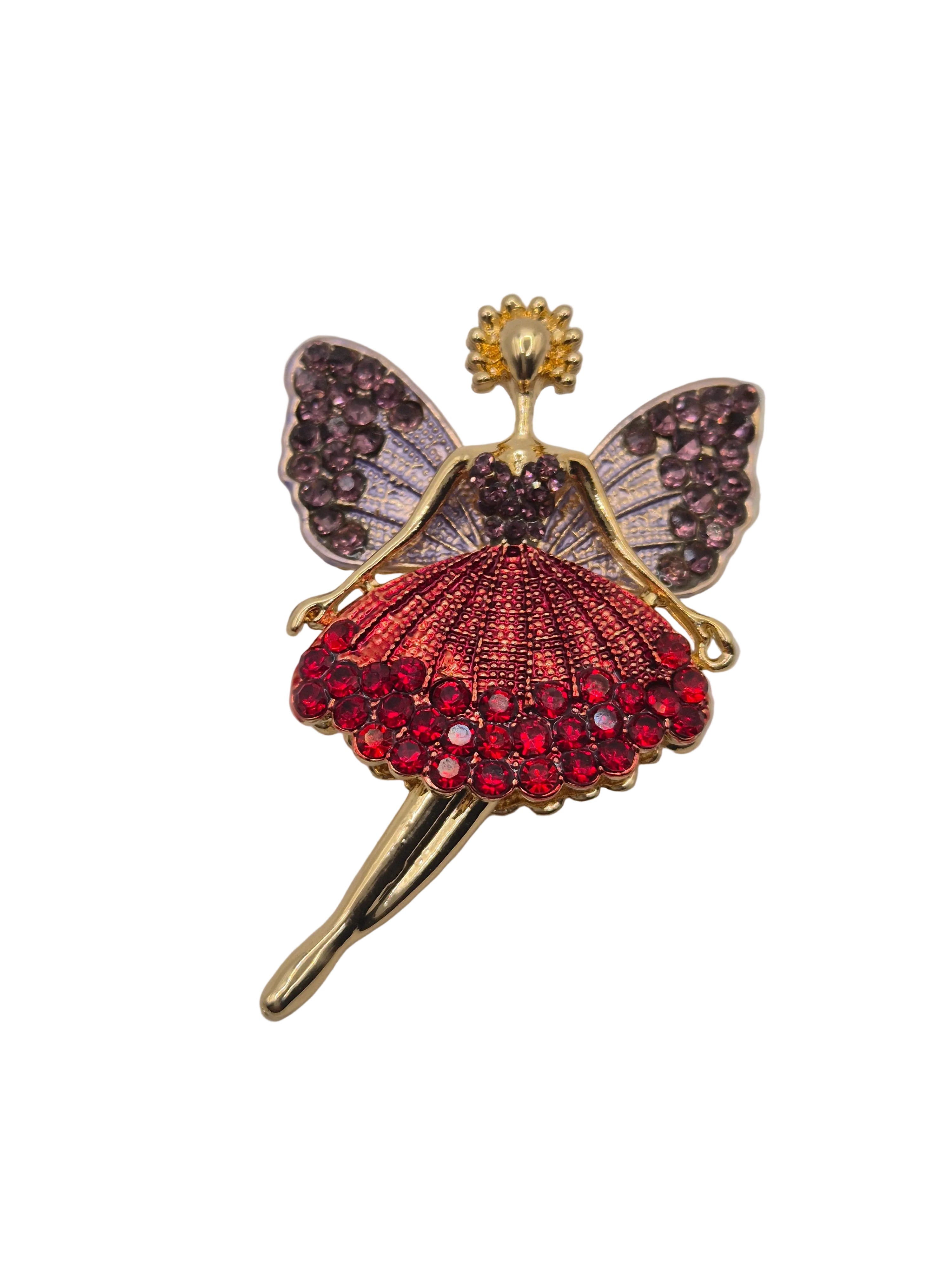 fairy brooch with pendant legs on plain background with rhinestones