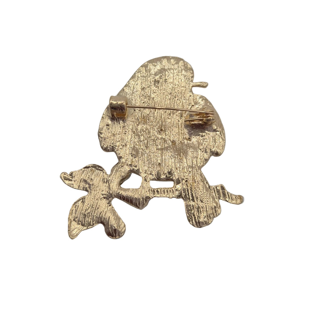 A textured gold-tone metal pin shaped like a robin bird, shown from the back on a plain white background.