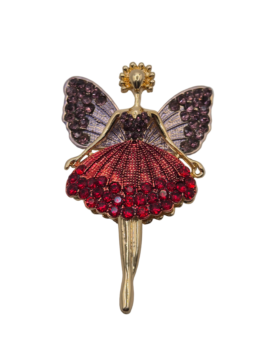 fairy brooch on plain background