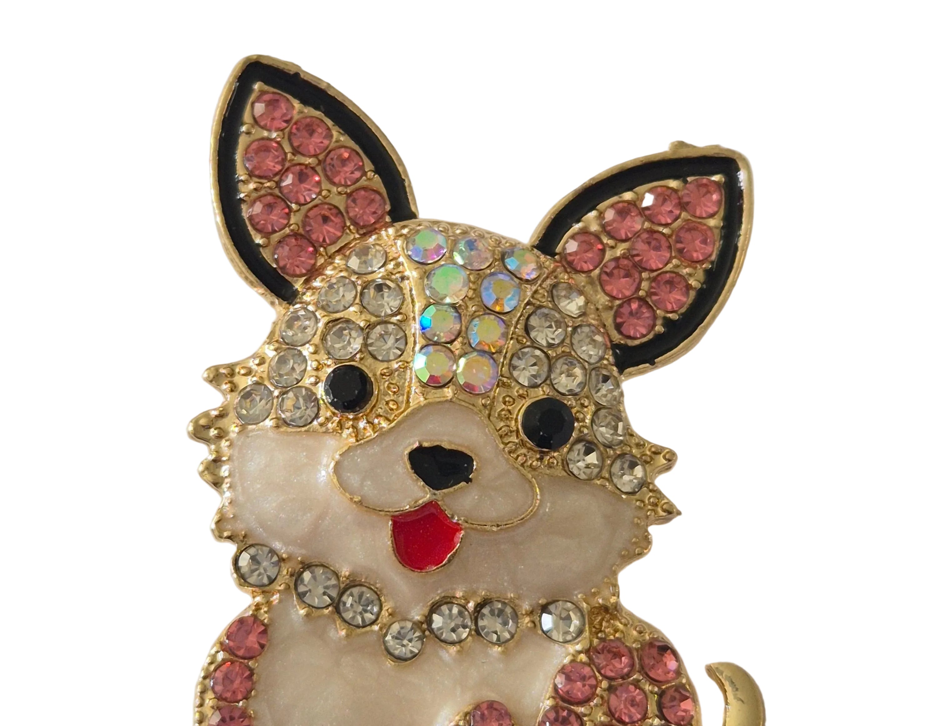 Decorative brooch with a dog design on a white background