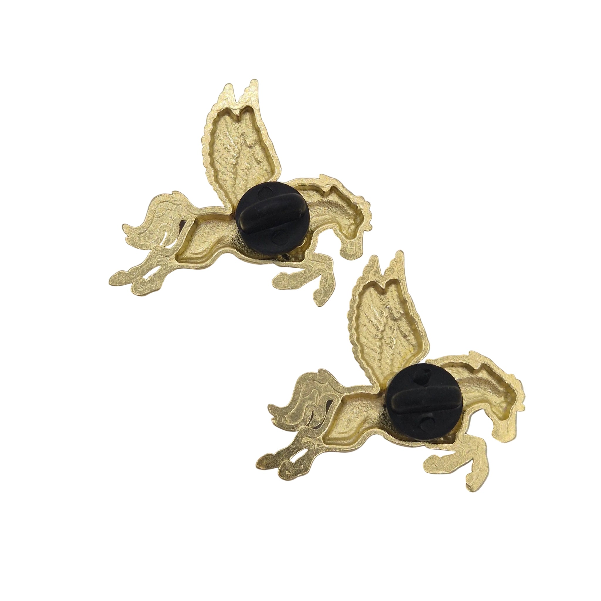 A pair of gold-tone Pegasus brooches shown on reverse on a plain white background.