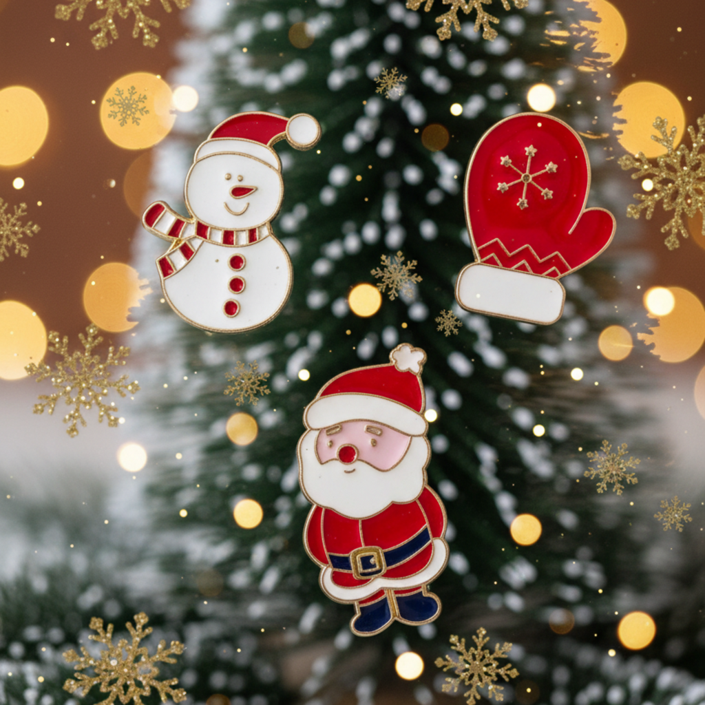 Three Christmas-themed enamel pins (a snowman, a red mitten, and Santa Claus) displayed against a festive background of a pine tree with gold bokeh lights and snowflakes.