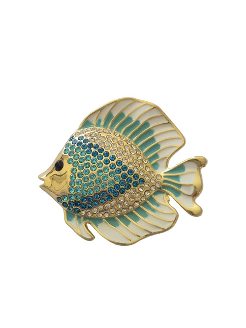 Decorative fish-shaped brooch with gold, blue, and green colors on a white background