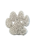 Decorative paw print brooch with rhinestones on a white background