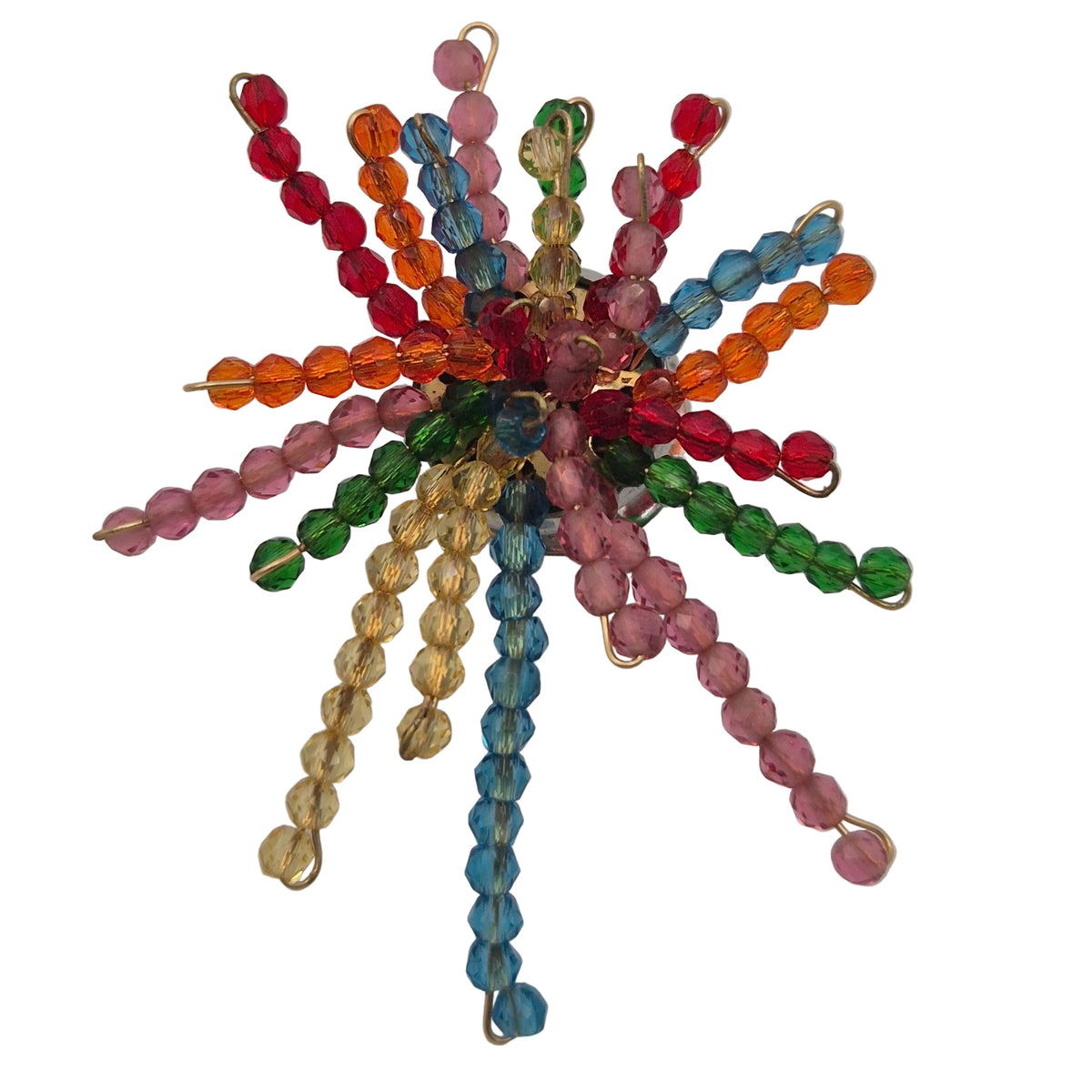 A colorful beaded firework burst brooch featuring faceted glass beads in red, orange, green, pink, blue, and yellow, arranged in radiating spokes with gold-tone metal wire loops at the tips.