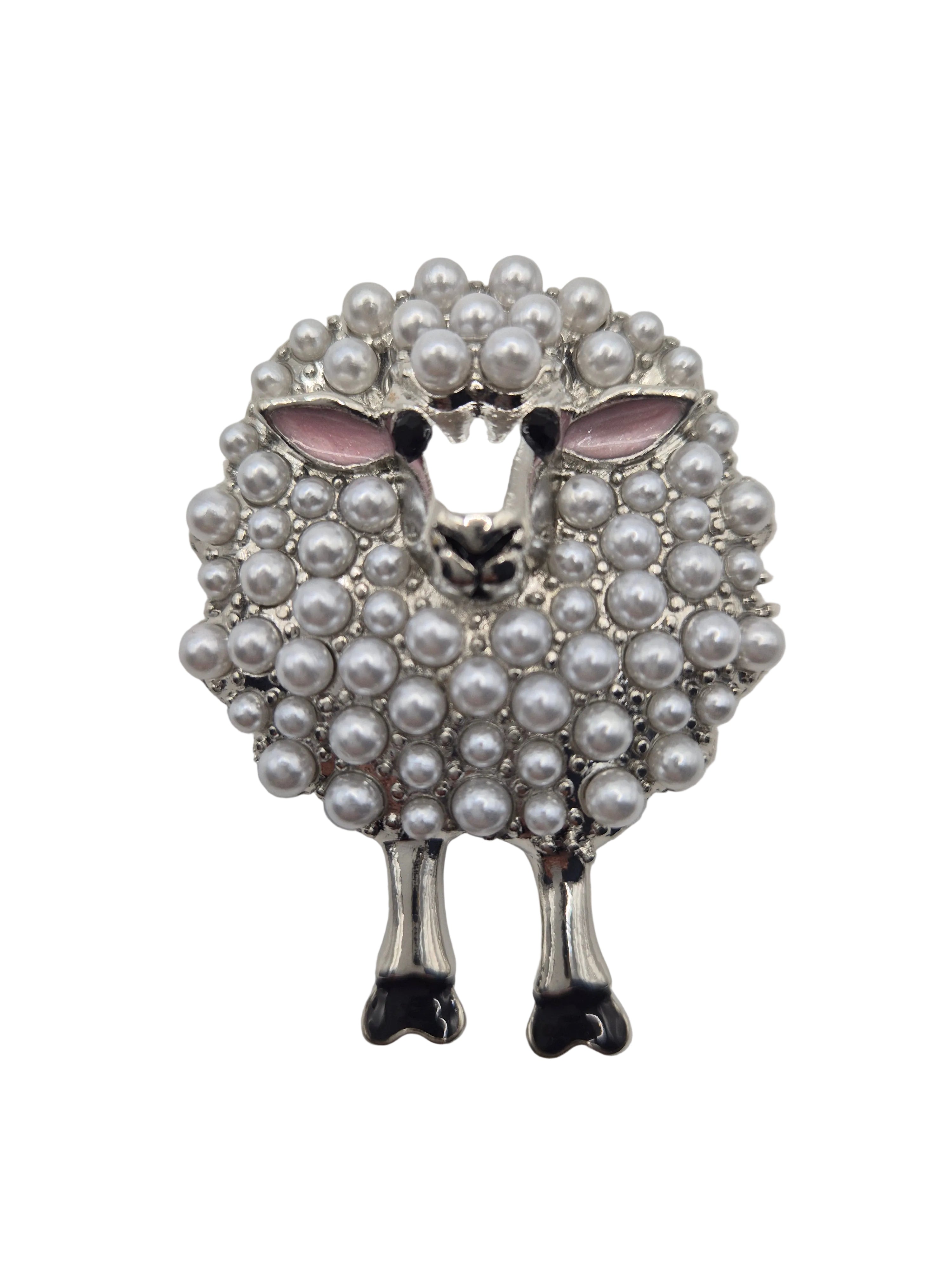 Sheep-shaped brooch with pearl detail beads on a white background