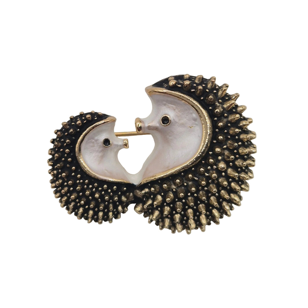 2 Hedgehogs facing each other brooch pin with gold spikes, displayed against a plain white background.