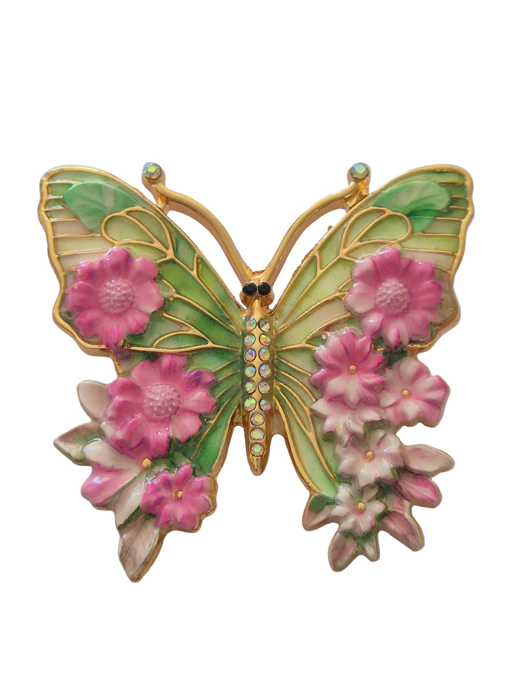 Butterfly-shaped brooch with pink flowers on a white background