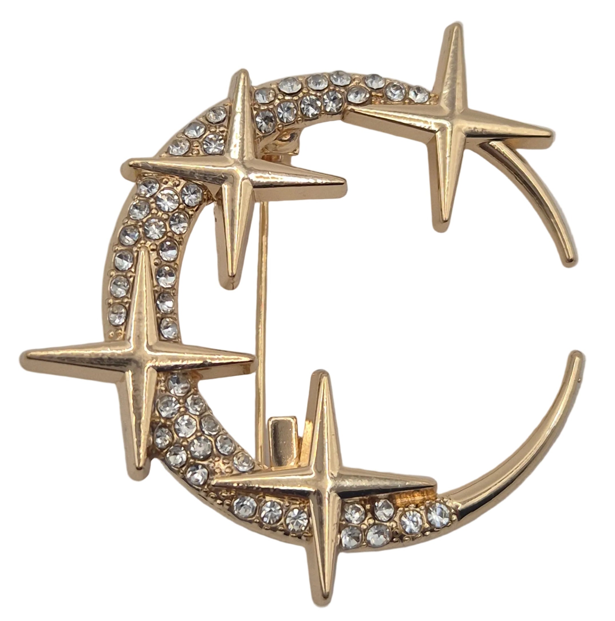 Gold rhinestone moon and stars celestial brooch on white background