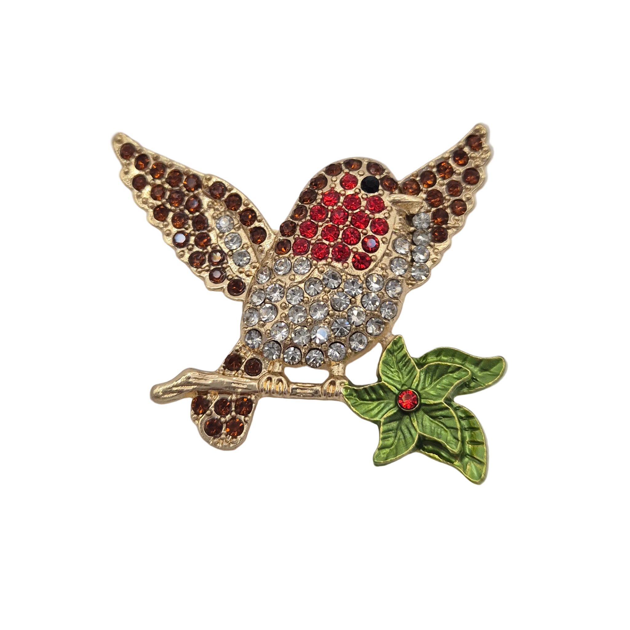 A gold-tone robin bird brooch embellished with red, brown, and clear rhinestones, perched on a green leafy branch with a small red center detail, shown on a plain white background.