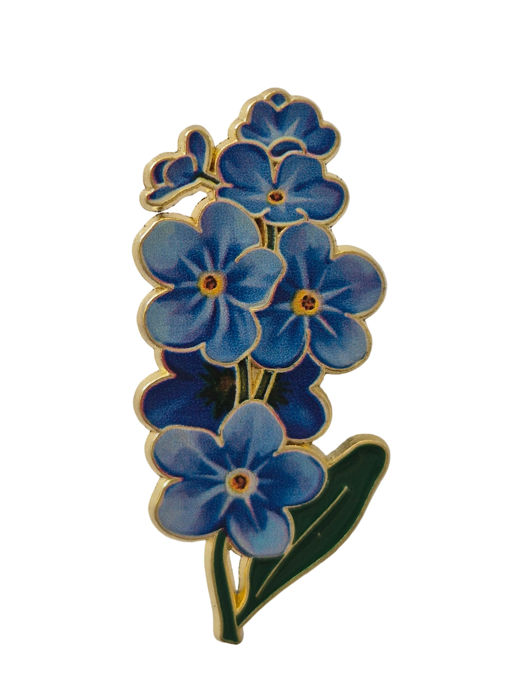 Blue floral design brooch on a white background